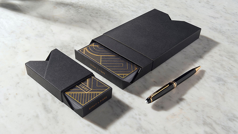 Luxury packaging for gold foiled business cards and postcards