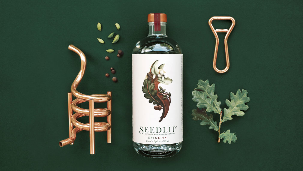 Seedlip campaign photography of bottle, copper pipes and spices