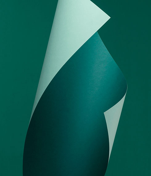 Luxury green paper photography capturing light and texture
