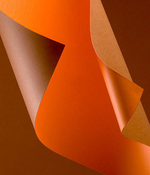 Luxury orange paper photography capturing light and texture