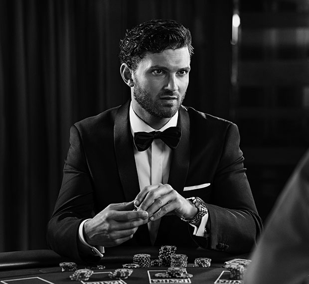 Launch campaign advertising photography of man playing blackjack