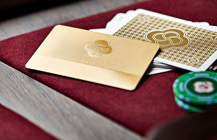 Lifestyle photography of branded membership and playing cards