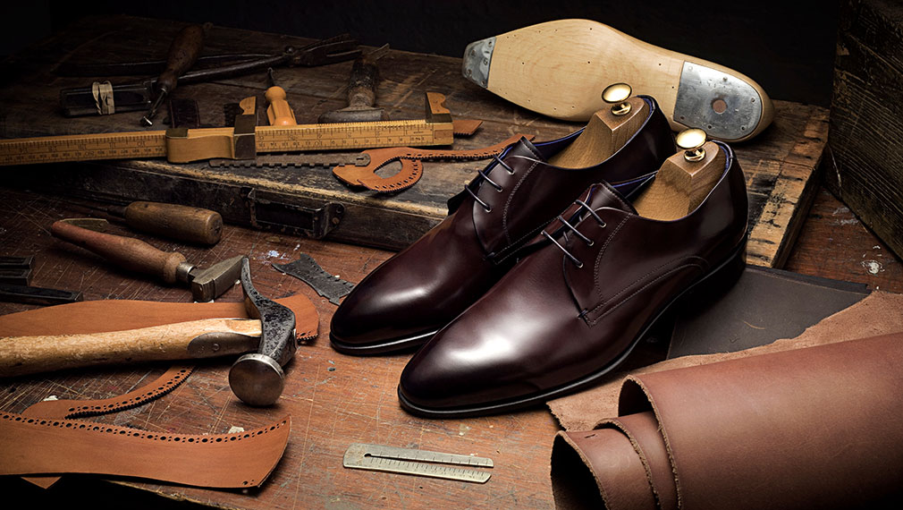 Traditional workshop photography for luxury mens Ted Baker leather shoes